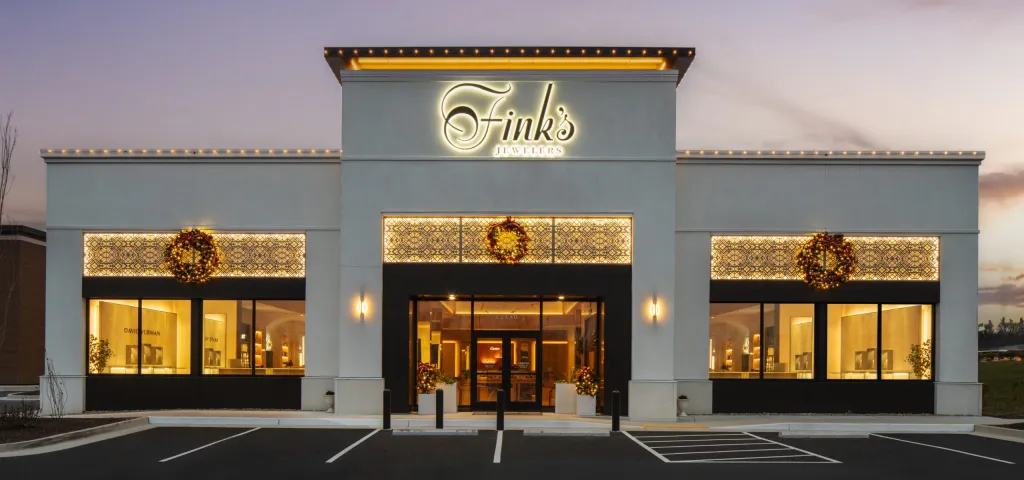 The same storefront outlined in warm white