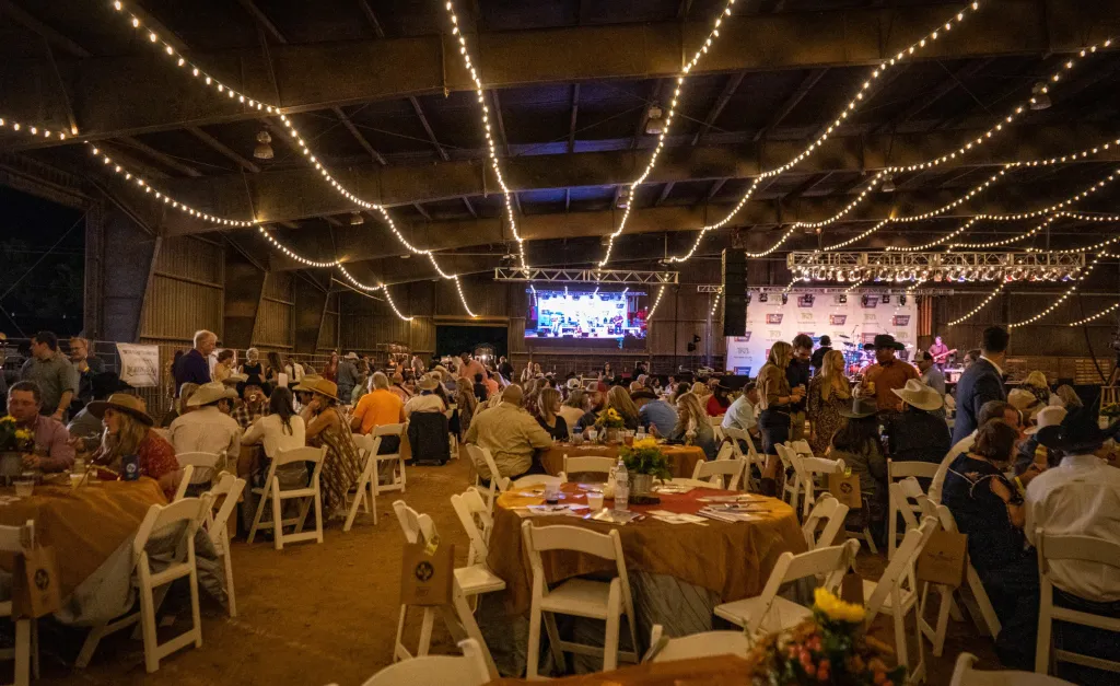The same arena set and lit for dinner